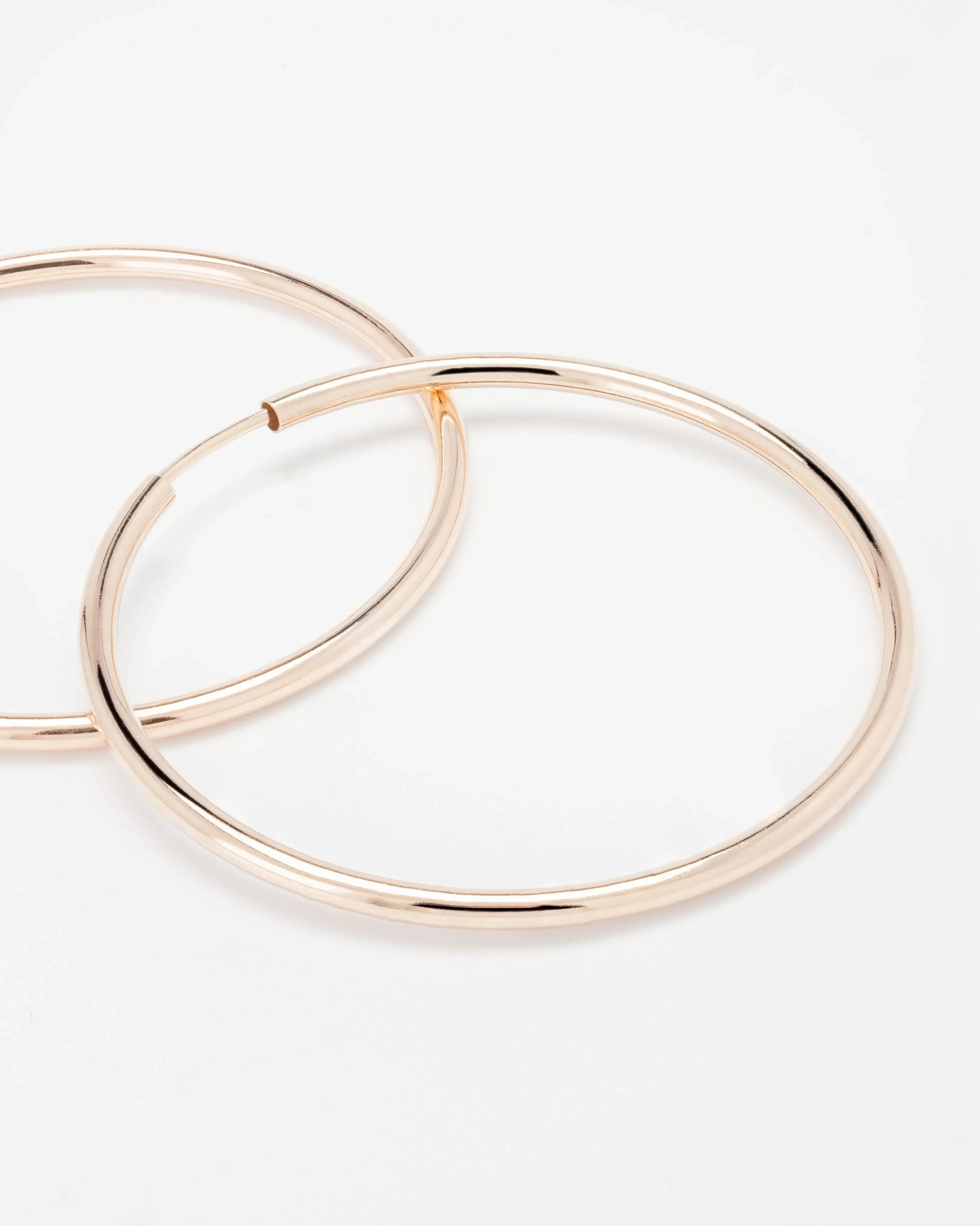 Sterling silver rose gold hoop earrings hotsell